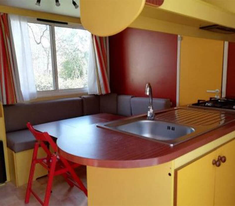 Coin repas mobil-home gamme confort 25m² - Camping Agde Le Neptune